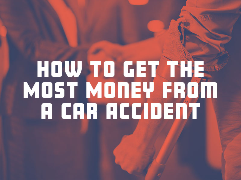 Injured car accident victim with crutch meeting with a car accident lawyer