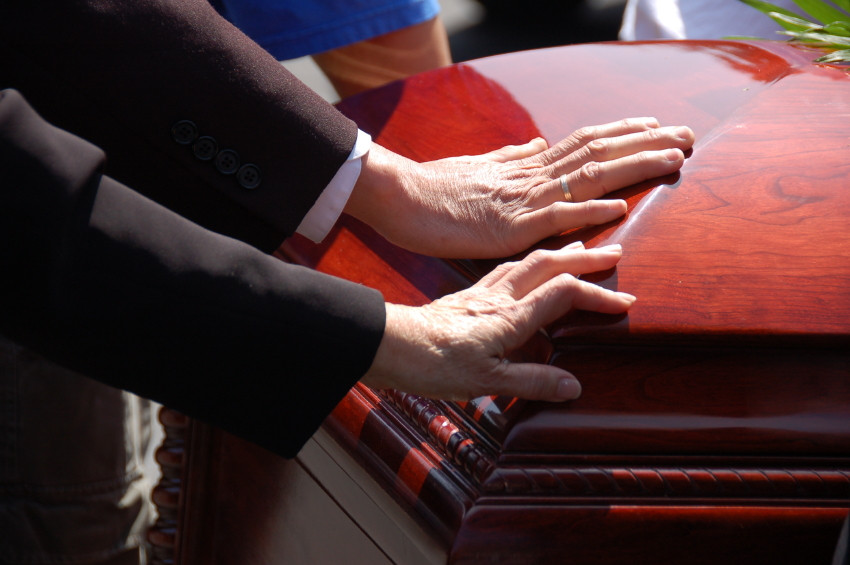 hand-on-coffin